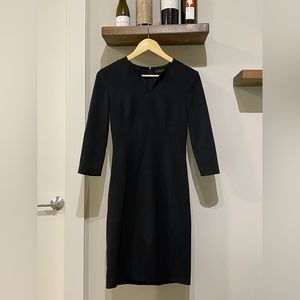 The row black dress